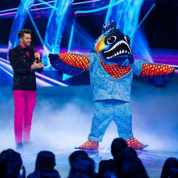 the masked singer 2024 final, piranha performs on stage