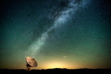 the milky way over a radio telescope at the karl g jansky very large array national radio astronomy observatory in new mexico