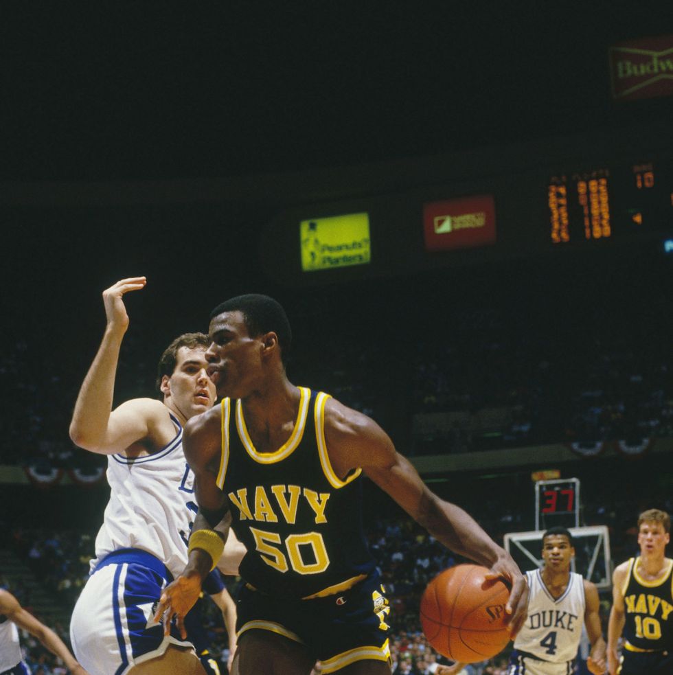 undated: the navy's david robinson #50 dribbles downcourt during a ncaa basketball game against duke. (photo by focus on sport via getty images)