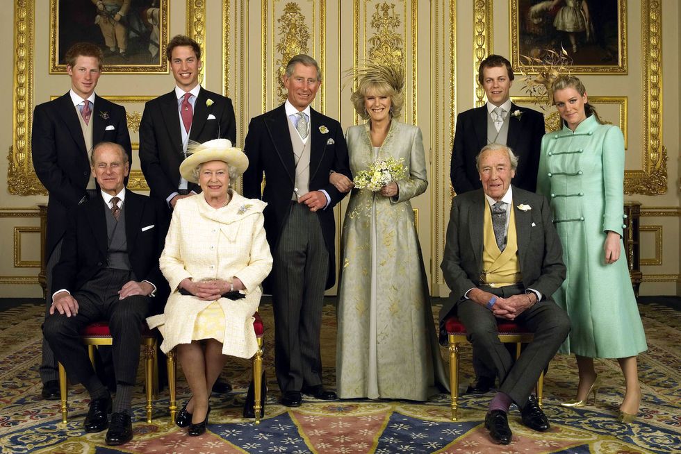 prince philip, queen elizabeth ii and bruce shand sit in the front row, prince harry, prince william, prince charles, camilla parker bowles, tom parker bowles and laura parker bowles stand in the back row inside an ornate room