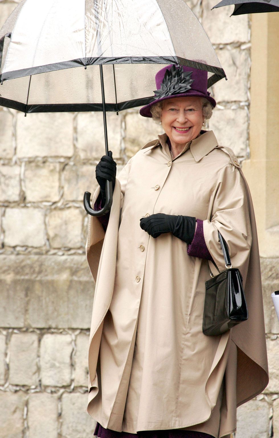The Queen Watches A Parade Of Aston Martin Cars At Windsor Castle, On St.George'S Day