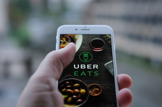 amazon, instagram and uber app on various devices