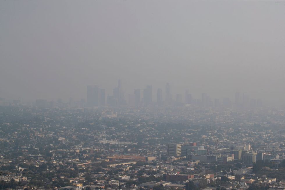 the view of downtown los angeles skyline is obscured by smoke, ash and smog as seen from the griffith observatory monday, sept 14, 2020