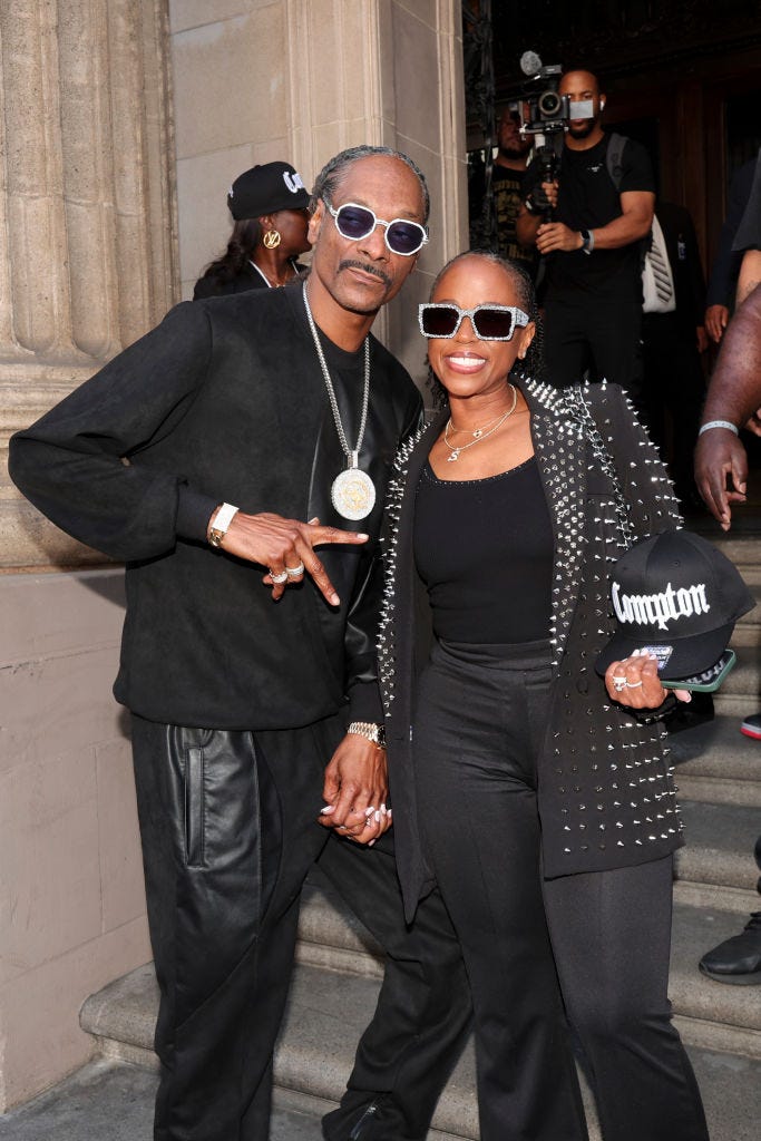 snoop dogg and shante broadus at the star ceremony where dr dre is honored with a star on the hollywood walk of fame on march 19, 2024 in los angeles, california