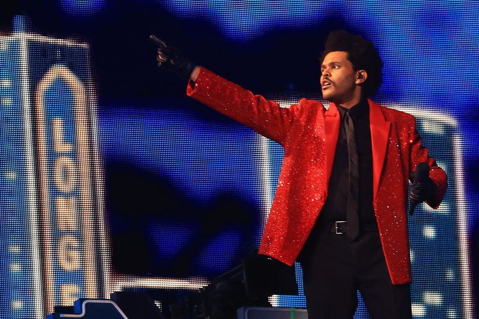 the weeknd performs onstage during the super bowl lv halftime show