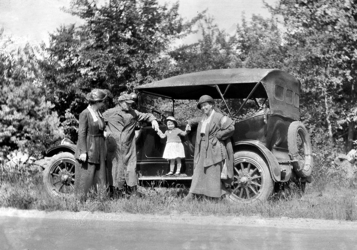 Family Poses with Car in 1919