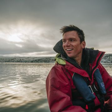 bill weir outdoors in a small boat on water