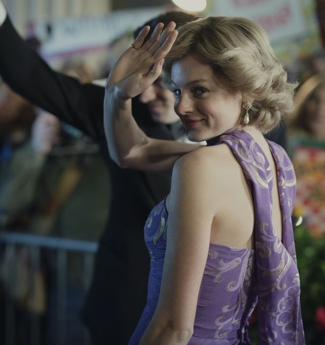 emma corrin as princess diana wearing a purple evening gown
