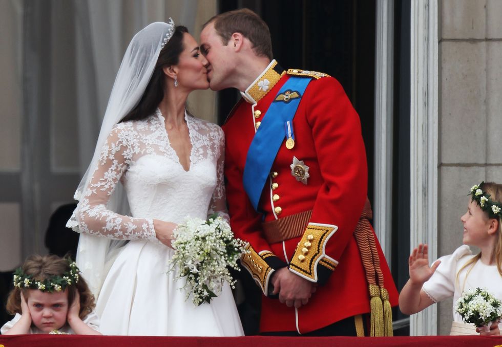royal wedding the newlyweds greet wellwishers from the buckingham palace balcony