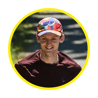 runner in colorful hat