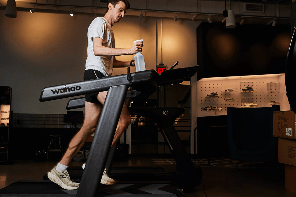 person running on a treadmill in a fitness setting