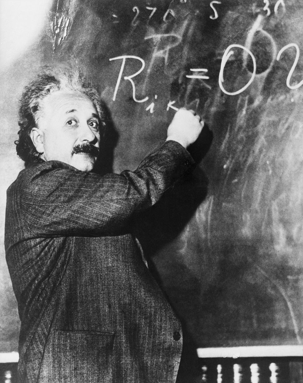 Write Einstein's equation on the board