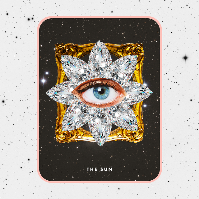 the tarot card the sun showing a blue eye in the center of a diamond star