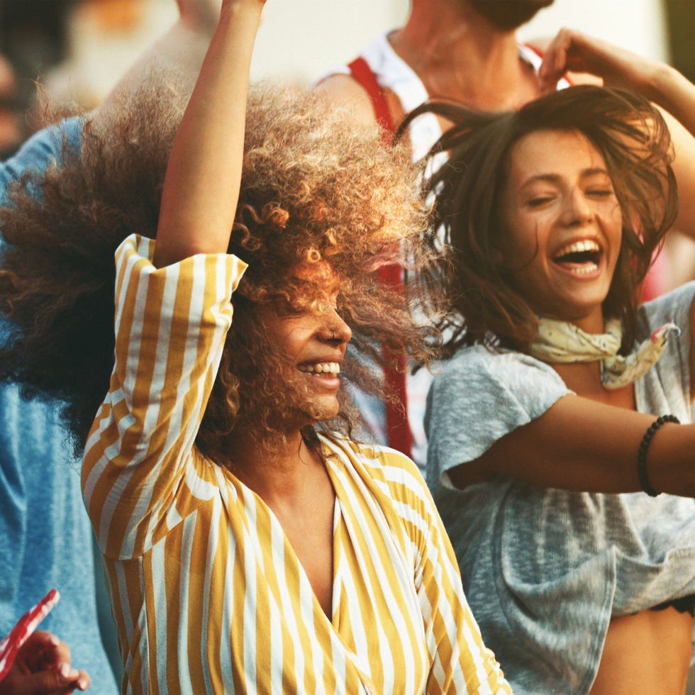 things to do by yourself woman attending a concert