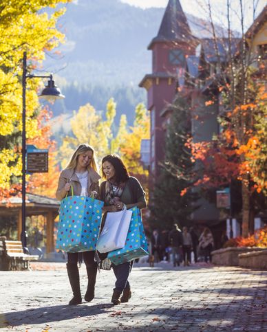 two female friends excited about shopping during thanksgiving season