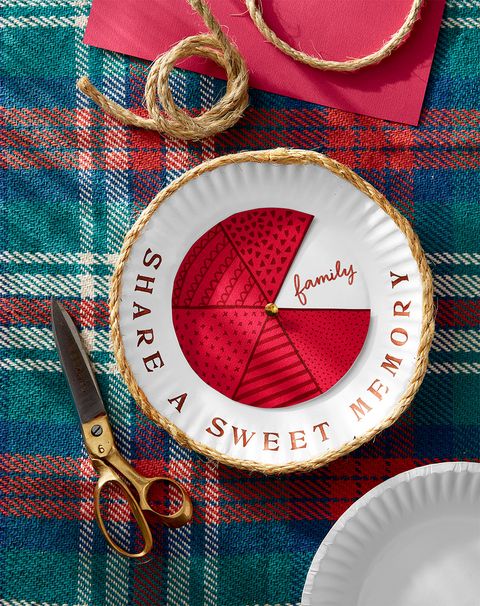 spin the wheel gratitude game made with paper plate, red paper, and twine that says share a sweet memory