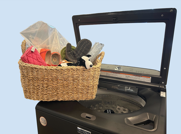 a basket of items on a washing machine