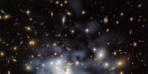 this nasa hubble space telescope image shows the distribution of dark matter in the center of the giant galaxy cluster abell 1689, containing about 1,000 galaxies and trillions of stars