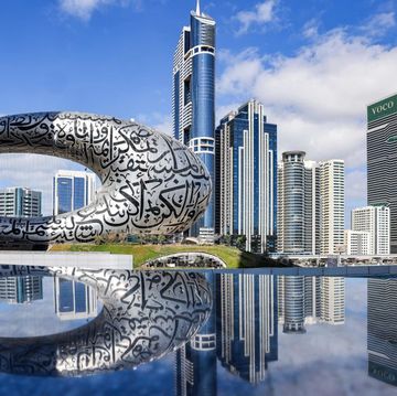 dubai's museum of the future pictured next to other prominent buildings marking the city skyline