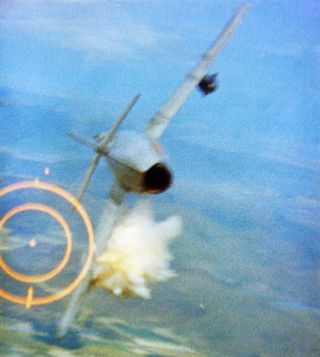 a us air force pilot hits ﻿a mig 17 with 20mm shells from his﻿ f 105d thunderchief pilot during a dogfight over north vietnam, june 3, 1968