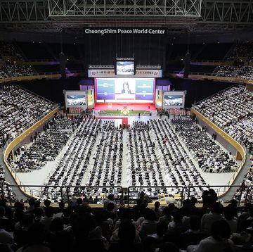 unification church holds mass wedding