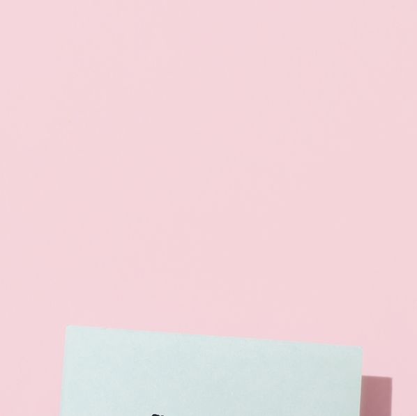 Three Blue Sticky Blank Notes On Pink Background