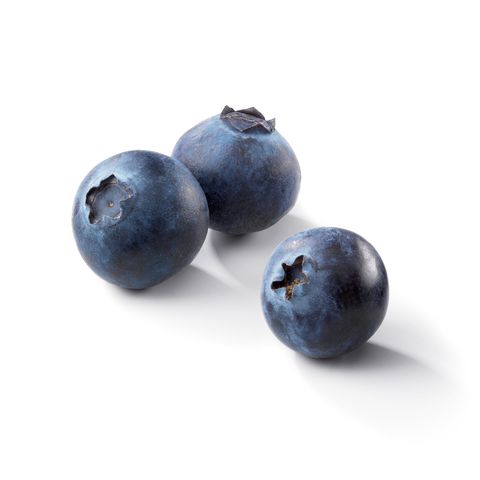 Three blueberries on a white background