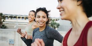 mental health therapy for endurance athletes what to know, group of women running and smiling