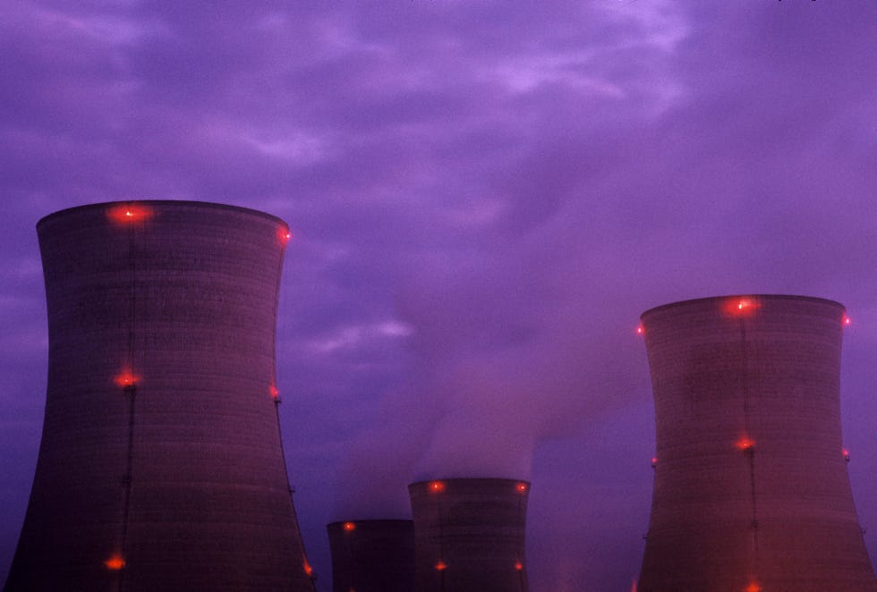 the cooling towers of the damaged three mile island nuclear plant glow at dusk photo by karen kasmauskicorbis via getty images