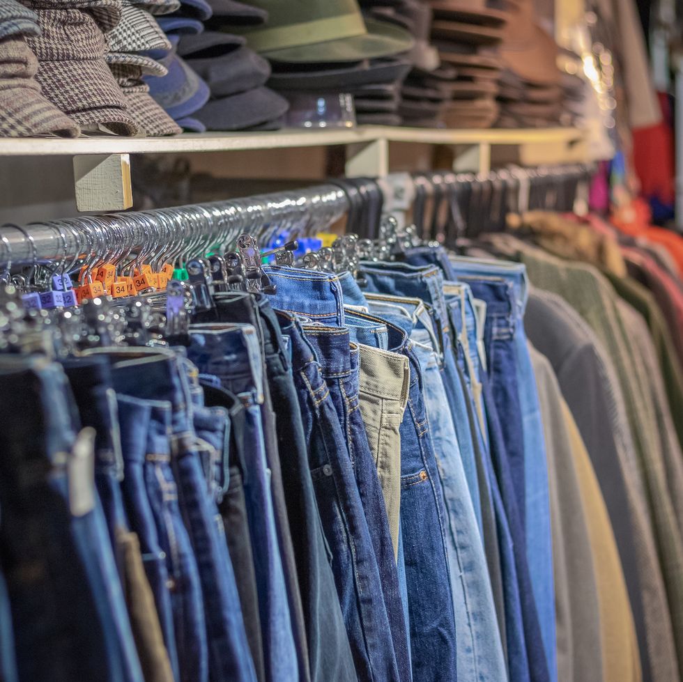 selection of vintage denim jeans on display at camden market in london
