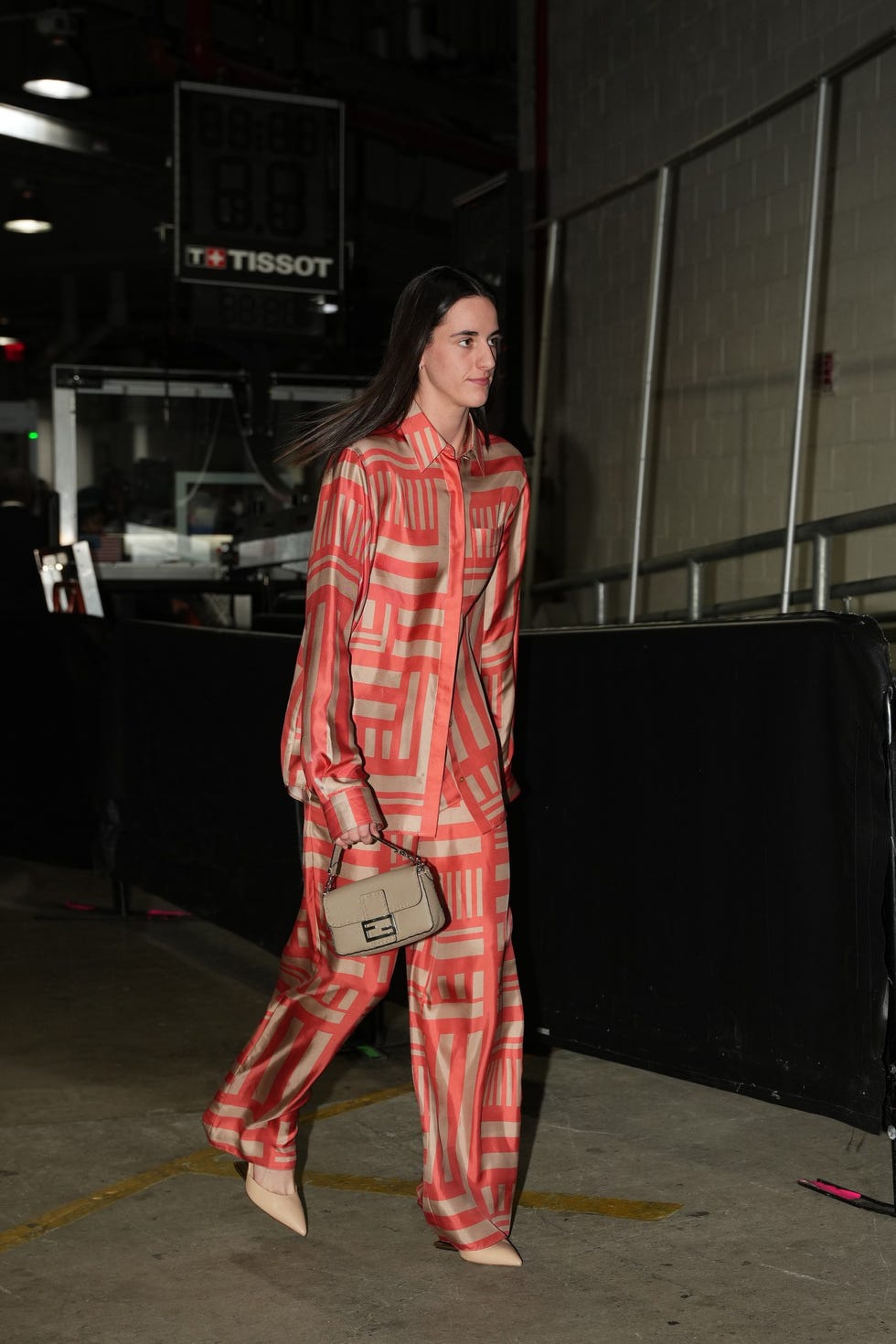 Caitlin Clark Walks WNBA Tunnel in Fendi Set and Denim Jumpsuit