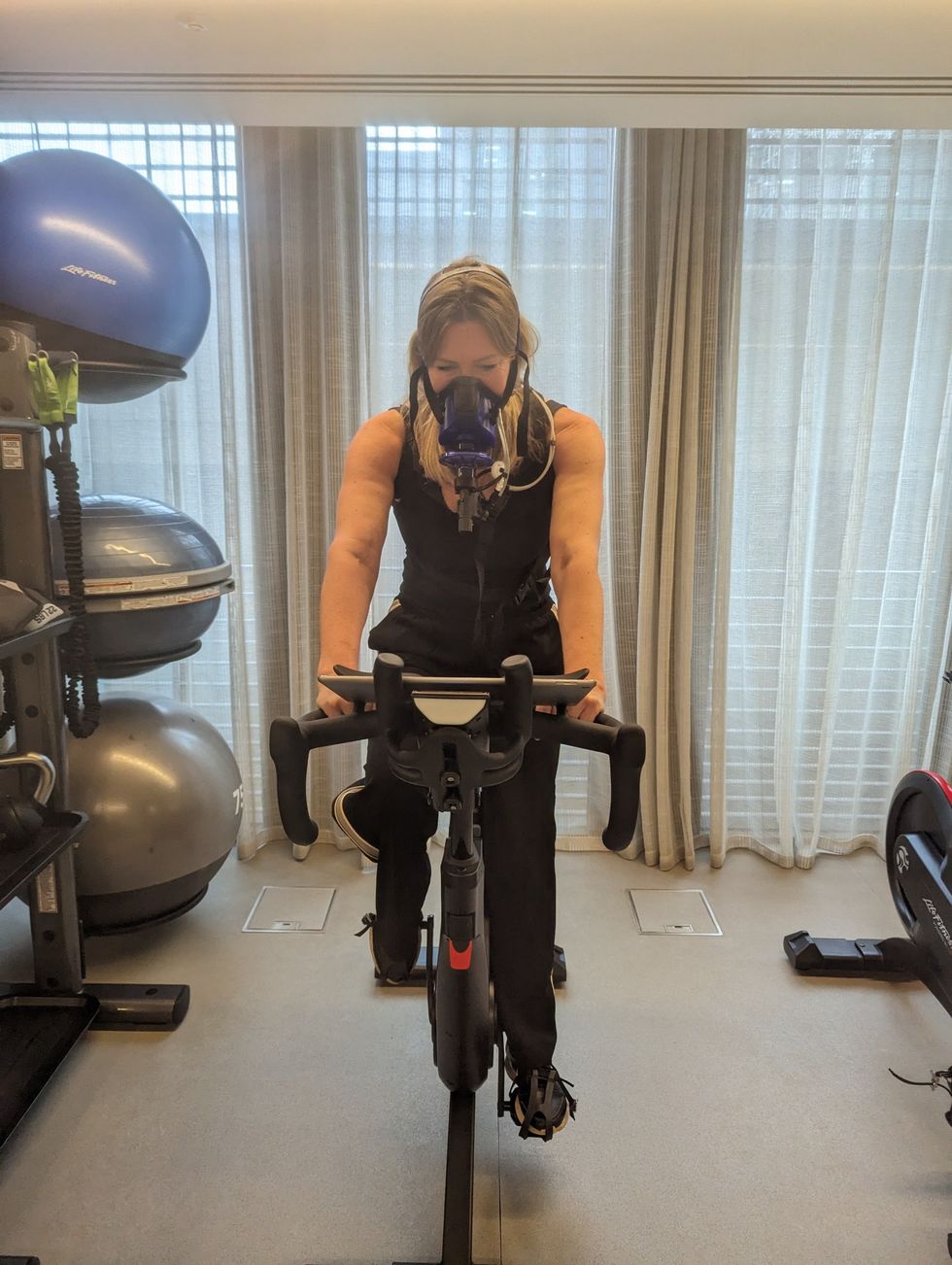 a person on a exercise bike
