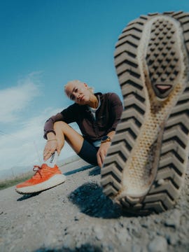 a person relaxing on a gravel road showcasing running shoes and a closeup view of a shoe sole