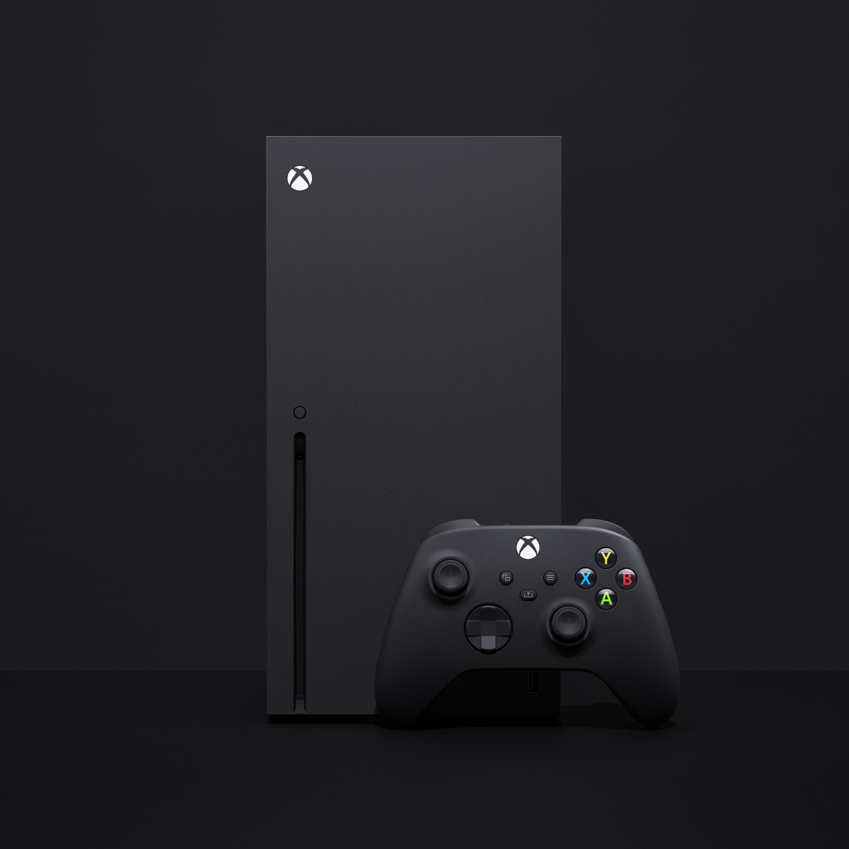 xbox series x pictured with its controller against a greyblack background
