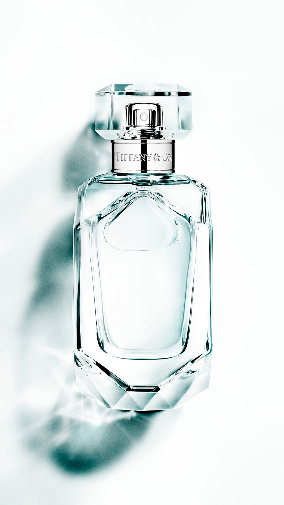 Perfume, Product, Water, Glass bottle, Bottle, Liquid, Fluid, Glass, Cosmetics, Transparent material, 