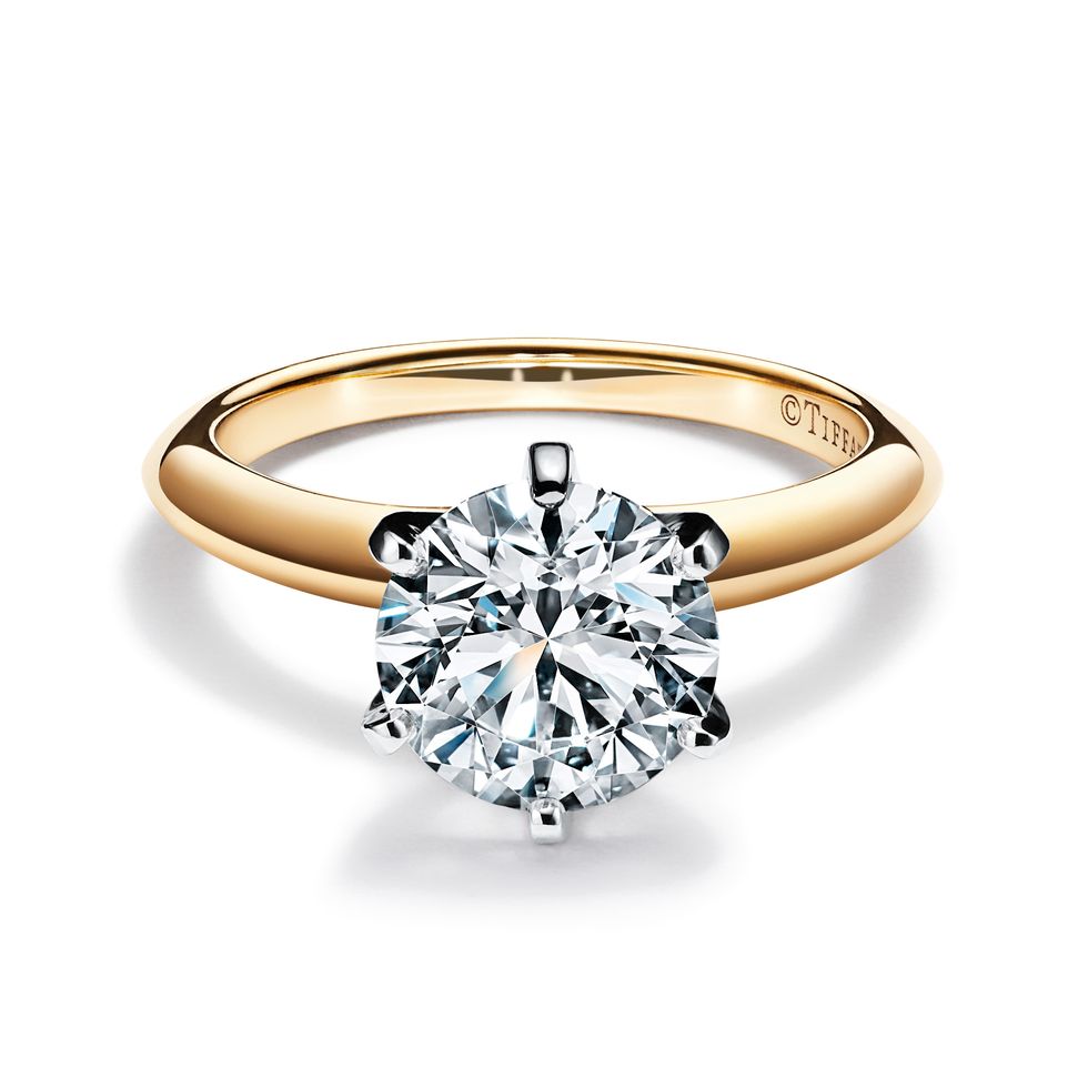 a ring with a diamond in it