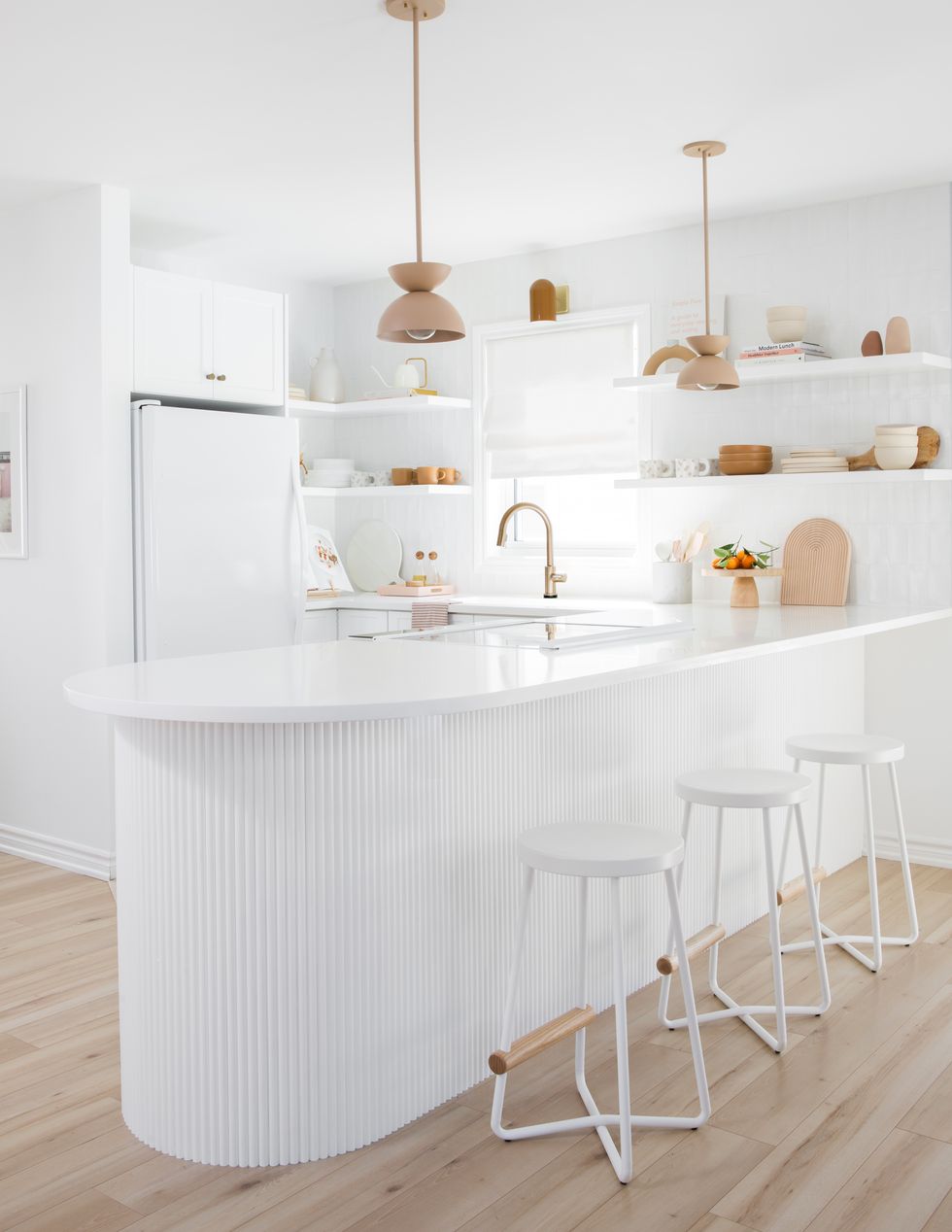 white kitchen with light wood