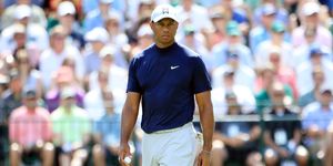 augusta, georgia   april 11 tiger woods of the united states looks on from the 15th green during the first round of the masters at augusta national golf club on april 11, 2019 in augusta, georgia photo by andrew redingtongetty images