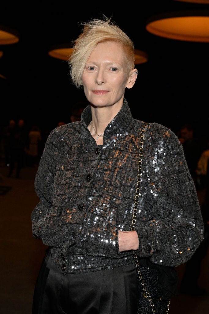 Tilda Swinton wears sequin jacket at Paris Fashion Week