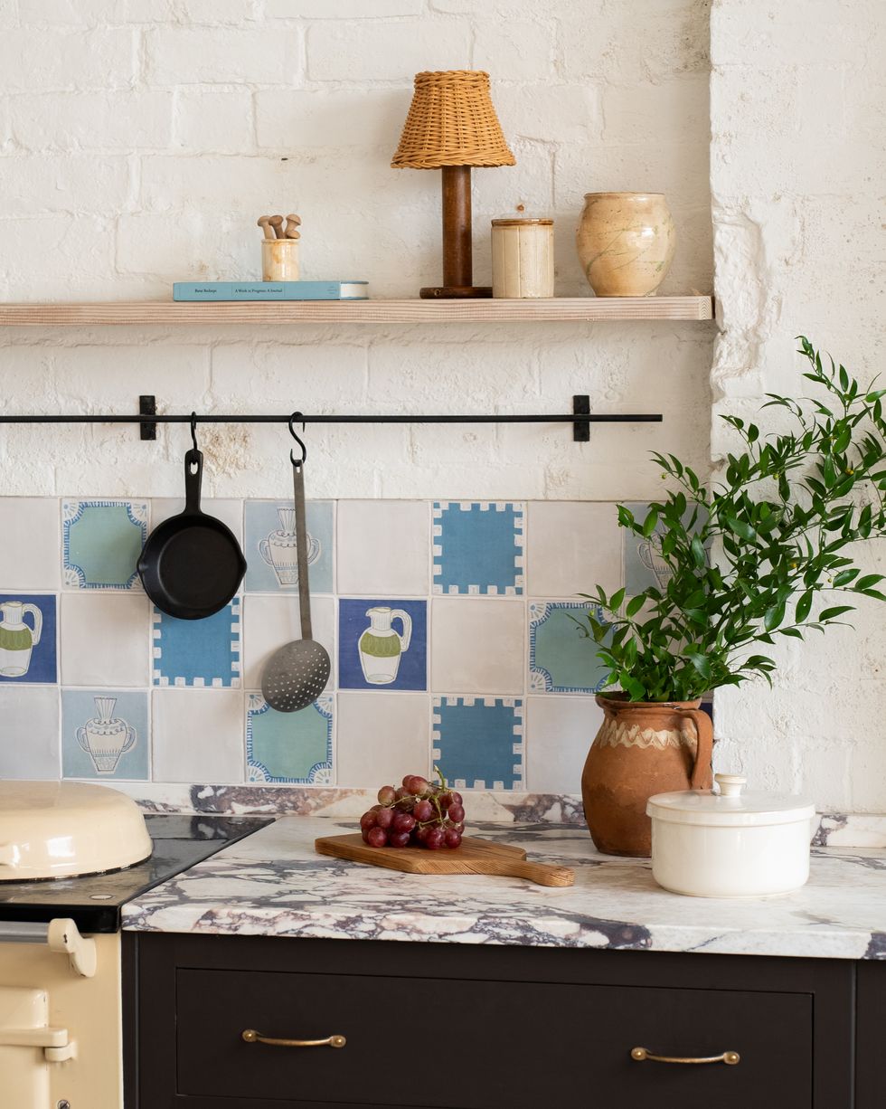 tile patterns mix and match blue tiles in a white kitchen