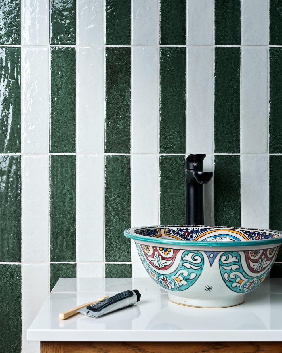 green and white striped bathroom tile pattern