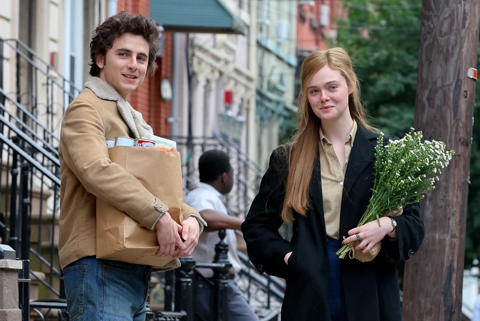 timothee chalamet and elle fanning on the set of a complete unknown