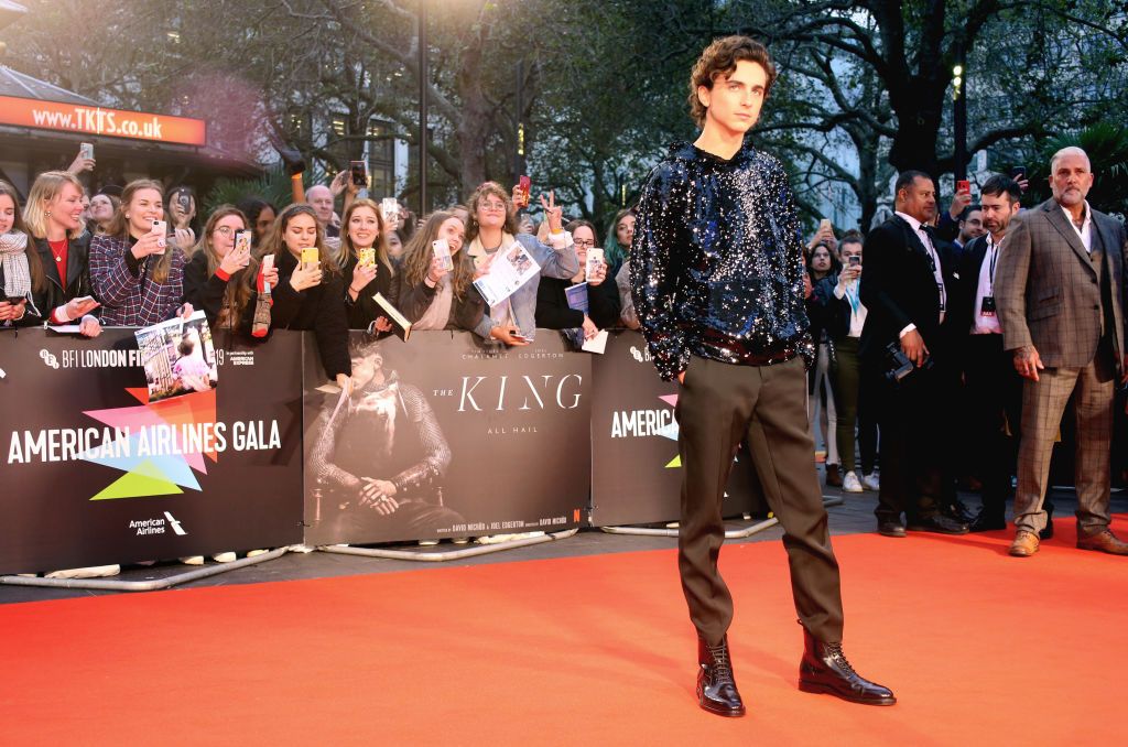 Timothée Chalamet Wears a Sequined Hoodie to The King UK Premiere