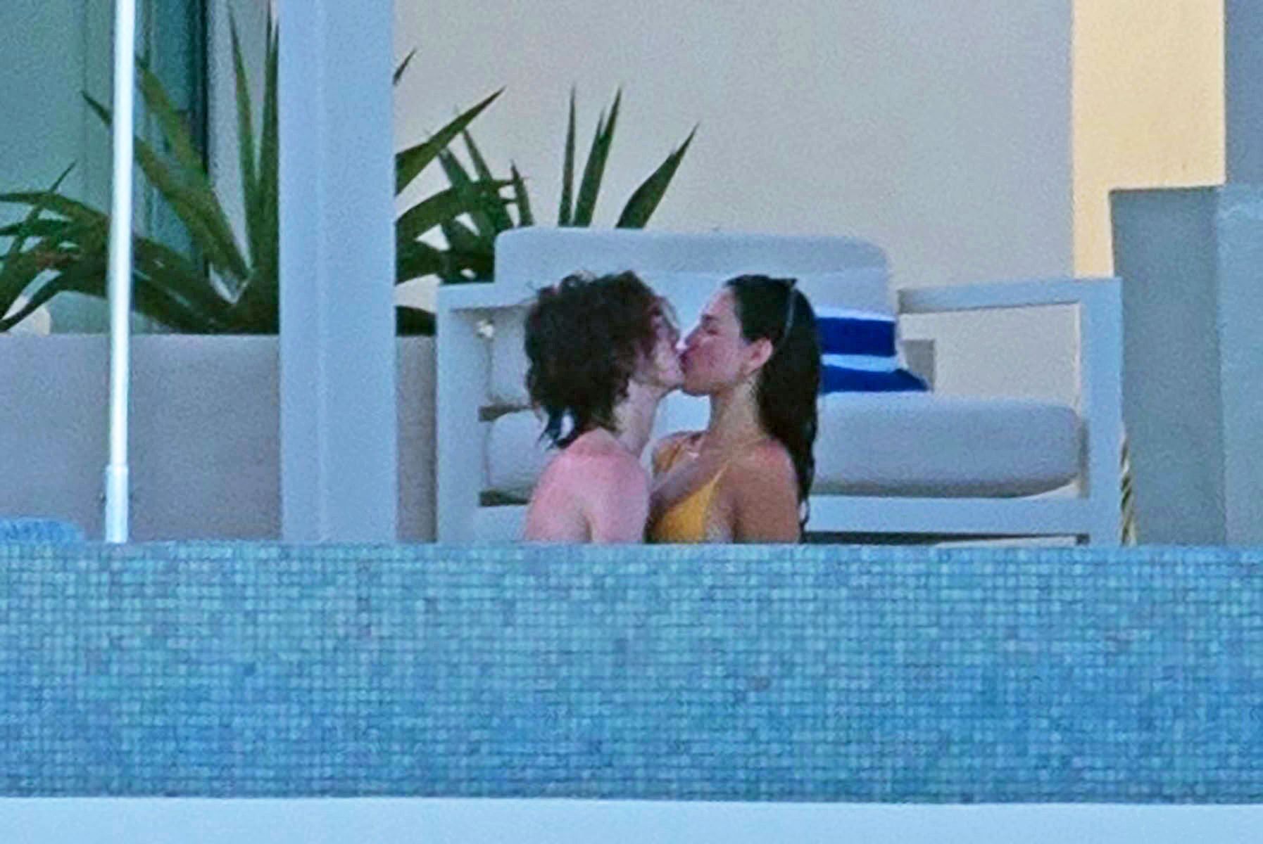 Timothée Chalamet and Eiza González Passionately Kiss in Pool image photo