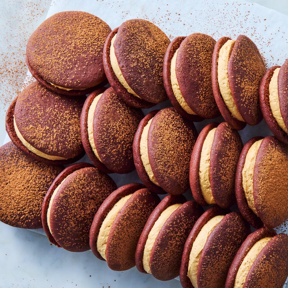chocolate whoopie pies with cream sandwiched between