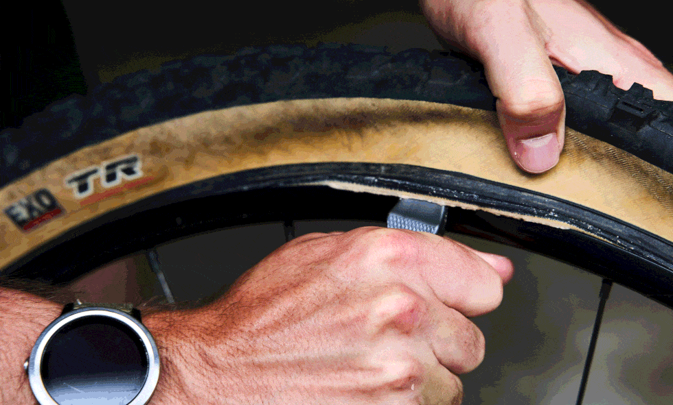 removing a tire with levers
