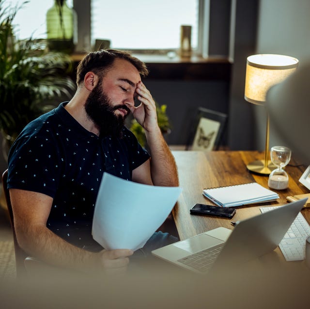 tire man paying bills and banking online