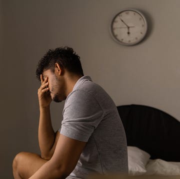 Tired man just woke up. Concept of low energy and sleeplessness. tired man just woke up concept of low energy and sleeplessness