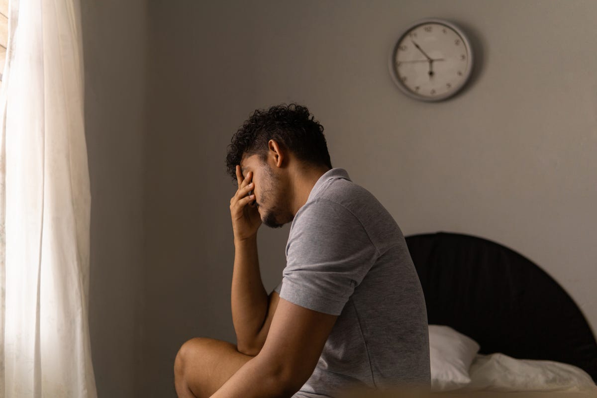 tired man just woke up concept of low energy and sleeplessness