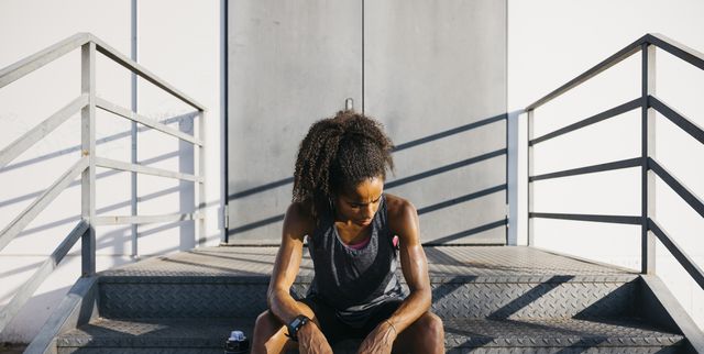 https://hips.hearstapps.com/hmg-prod/images/tired-woman-sitting-and-resting-after-workout-royalty-free-image-1737494634.pjpeg?crop=1.00xw:0.753xh;0,0.209xh&resize=640:*